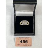 A silver and silver gilt diamond ring. 7g. Size N