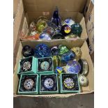 Two boxes of paperweights