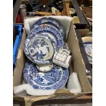 A box of blue and white flatware etc.