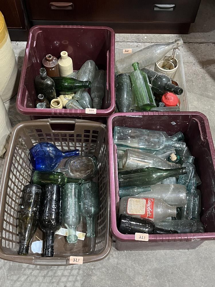 Four boxes of old bottles
