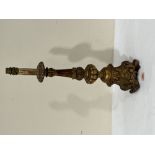 An Italian carved giltwood lamp. 18½' high excluding fitting. The base lead weighted. Losses to