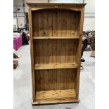 A pine open bookcase with five shelves. 72' high