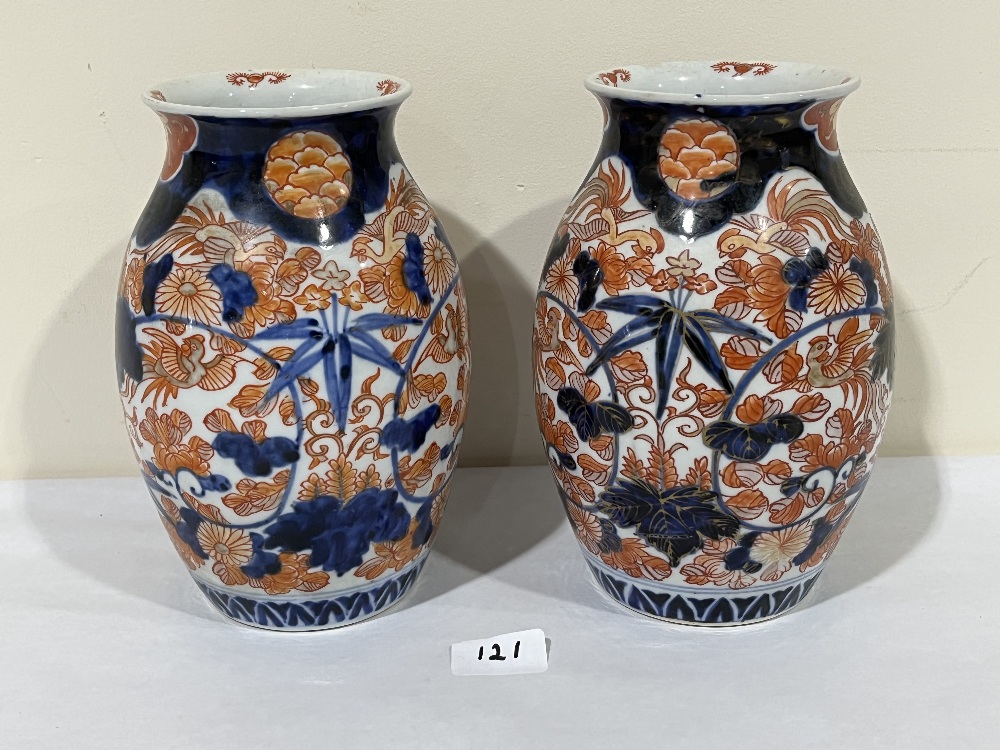 A pair of Japanese Imari vases. 9' high