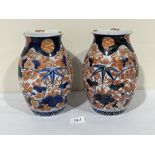 A pair of Japanese Imari vases. 9' high