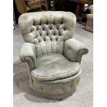 A buttonback tub chair