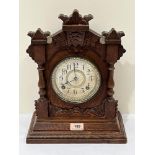 An American oak cased mantle clock. 15' high