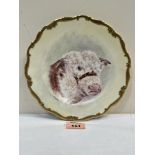 A plate painted with a Hereford Bull by G.Delaney. Signed. 8' diam.