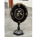 A Victorian papier-mache painted and mother-of-pearl inlaid snap-top table in the manner of