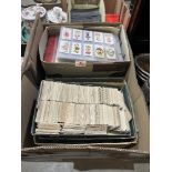 A large collection of cigarette cards