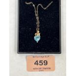 A 14ct blue topaz and diamond heart pendant on 9ct necklet chain. 1.7g gross