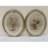 A pair of oval gilt frames, each with a watercolour flowerpiece. The frames 16½' x 13'