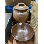 An earthenware jar and cover, probably Winchcombe and a glazed pottery bowl