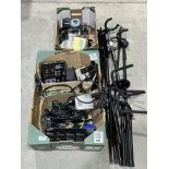 A quantity of instrument cables, guitar pedals, mixing console, two guitar stands, two mic stands