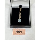 An 18ct emerald cut aquamarine pendant on 9ct necklet chain. 3.7g gross