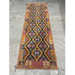 A Choli Kilim carpet runner. 2.47m x 0.83m