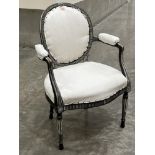 A 19th century decorated salon armchair in Chippendale style. 24' w x 36¾' h