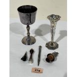 A white metal bud vase; a plated goblet; a plated propelling pencil; a cigar cutter; a letter seal