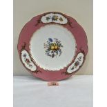 A Coalport plate painted with summer flowers to the centre and in three gilt reserves. Spurious