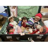 A case of vintage dolls
