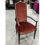 A late Victorian mahogany and line inlaid high backed armchair