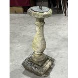 A sundial on statuary base. 37' high