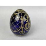 A MODERN FABERGE STYLE GLASS EGG