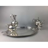 A VICTORIAN PLATED FOUR PIECE TEA AND COFFEE SERVICE AND TRAY