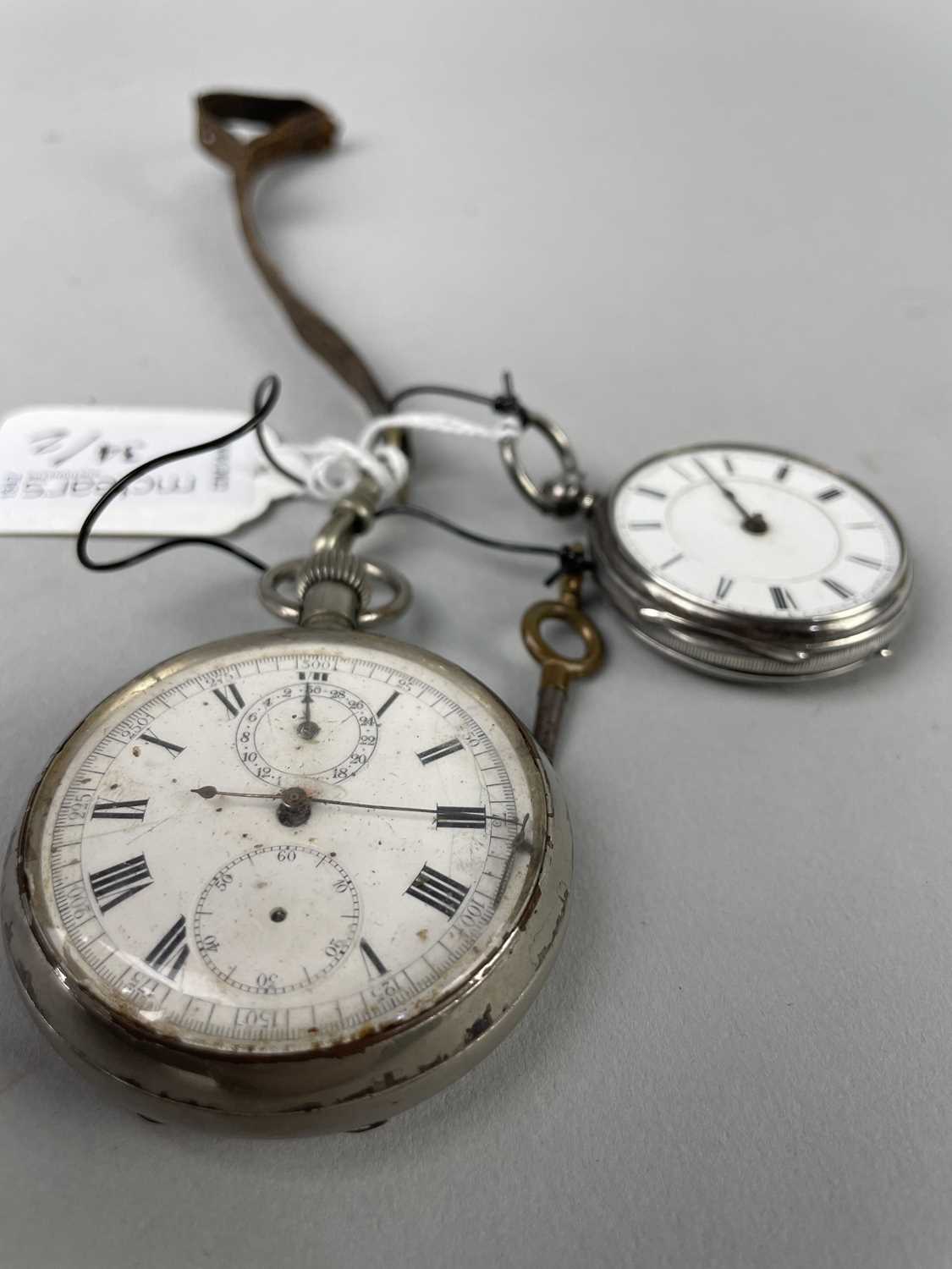 A SILVER POCKET WATCH AND A PLATED EXAMPLE