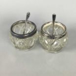 A PAIR OF SILVER COLLARED MUSTARD POTS AND SPOONS AND OTHER ITEMS