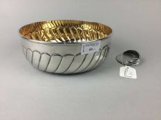 A SILVER PLATED SERVING BOWL AND A NAPKIN RING