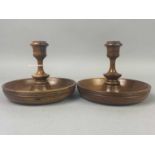 A PAIR OF TURNED WOOD CANDLESTICKS AND OTHER ITEMS