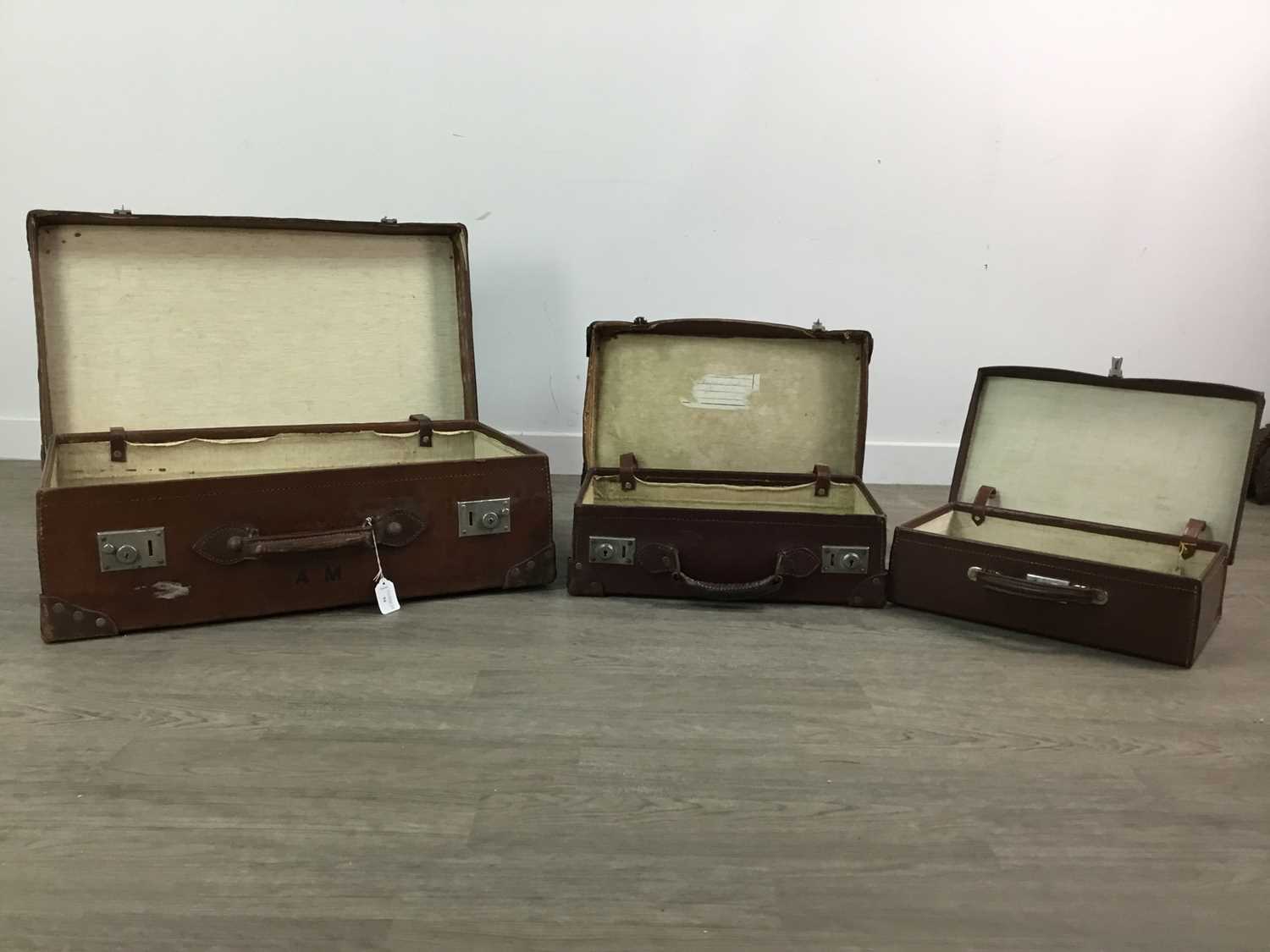 AN EARLY 20TH CENTURY LEATHER SUITCASE WITH TWO OTHERS - Image 2 of 2