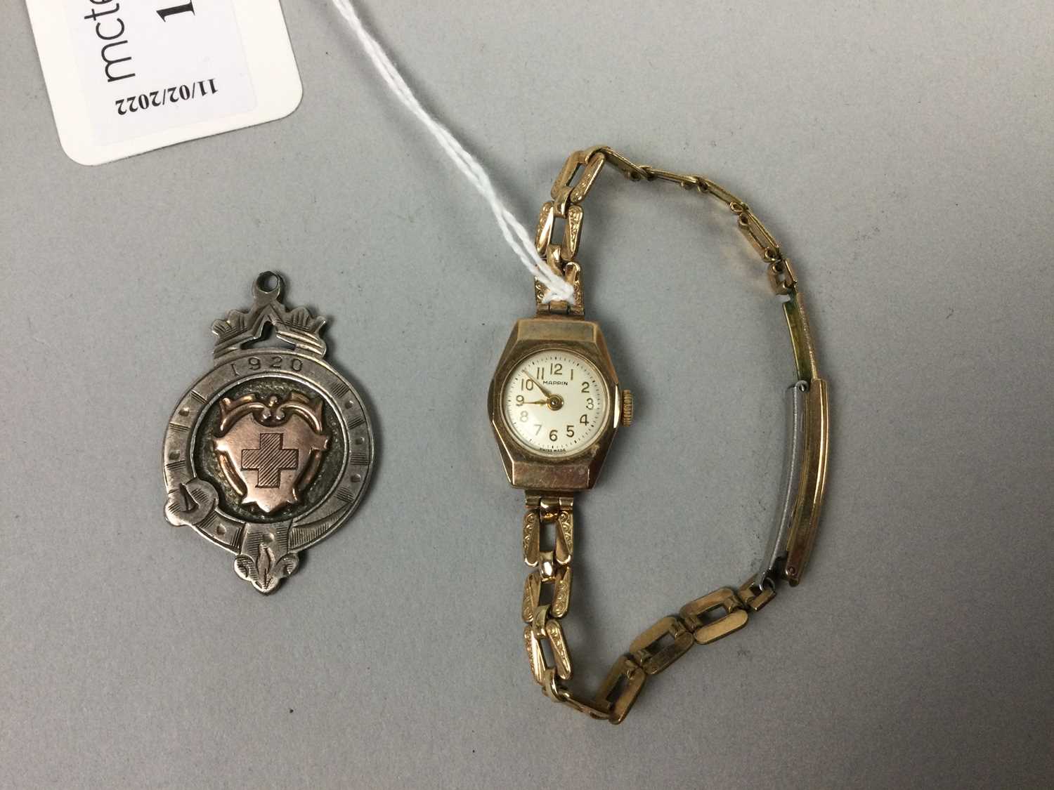 A LADY'S NINE CARAT GOLD BRACELET WATCH AND A SILVER MEDAL - Image 2 of 3