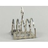 A SILVER FIVE BAR TOAST RACK