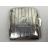 A SILVER CIGARETTE CASE