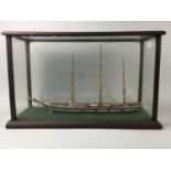 A SCRATCH BUILT MODEL SHIP IN DISPLAY CASE