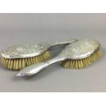 A PAIR OF SILVER MOUNTED HAIRBRUSHES AND A SILVER MOUNTED WALKING CANE