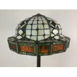 A STANDARD LAMP WITH TIFFANY STYLE SHADE