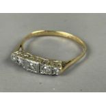 A DIAMOND FIVE STONE RING,