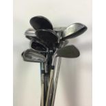 A COLLECTION OF GOLF CLUBS