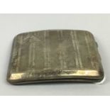 A SILVER CIGARETTE CASE