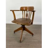 AN ANGUS OF LONDON OAK ADJUSTABLE SWIVEL CHAIR