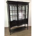 AN EBONISED FRENCH STYLE DISPLAY CABINET