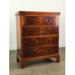 A MAHOGANY REPRODUCTION CHEST OF DRAWERS