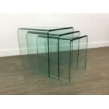 A CONTEMPORARY GLASS NEST OF THREE TABLES