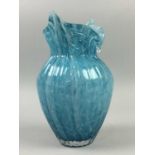 A TURQUOISE AND OPAQUE MOTTLED GLASS VASE, ANOTHER VASE AND WOOD CARVING