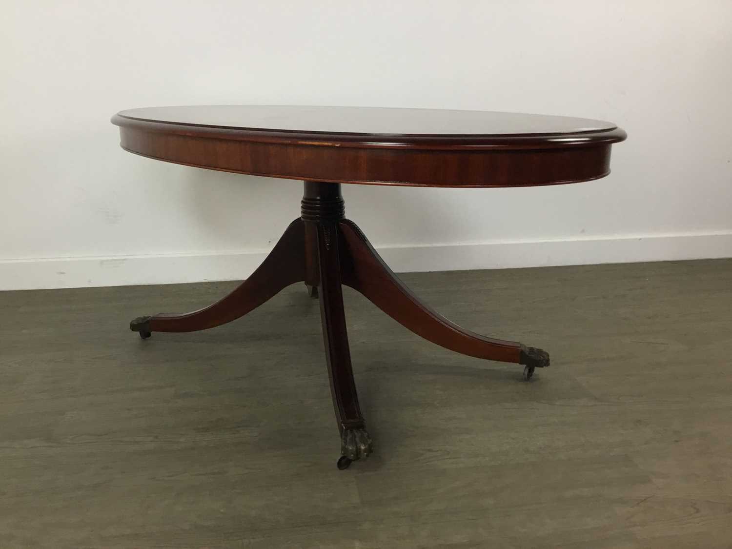 AN OVAL COFFEE TABLE AND AN OCCAISONAL TABLE