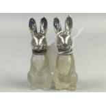 A PAIR OF SALT AND PEPPER SHAKERS