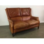 A BROWN LEATHER TWO SEAT SETTEE AND ARMCHAIR