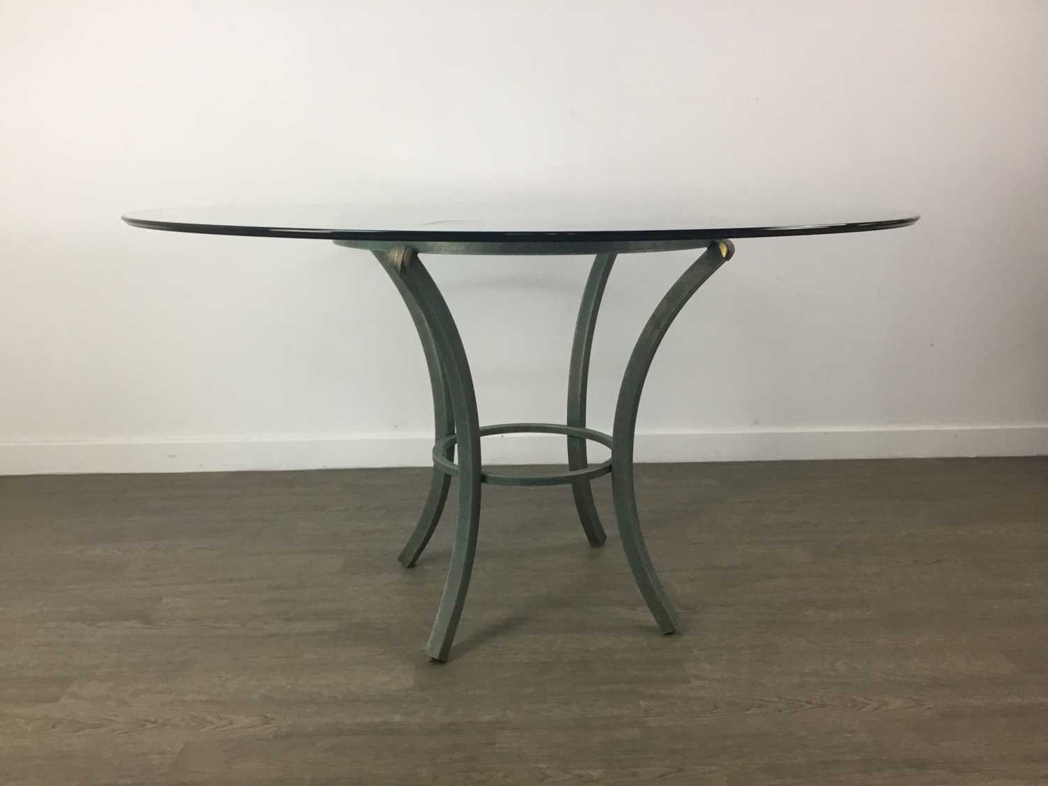 A MODERN GLASS TOPPED DINING TABLE AND FOUR CHAIRS